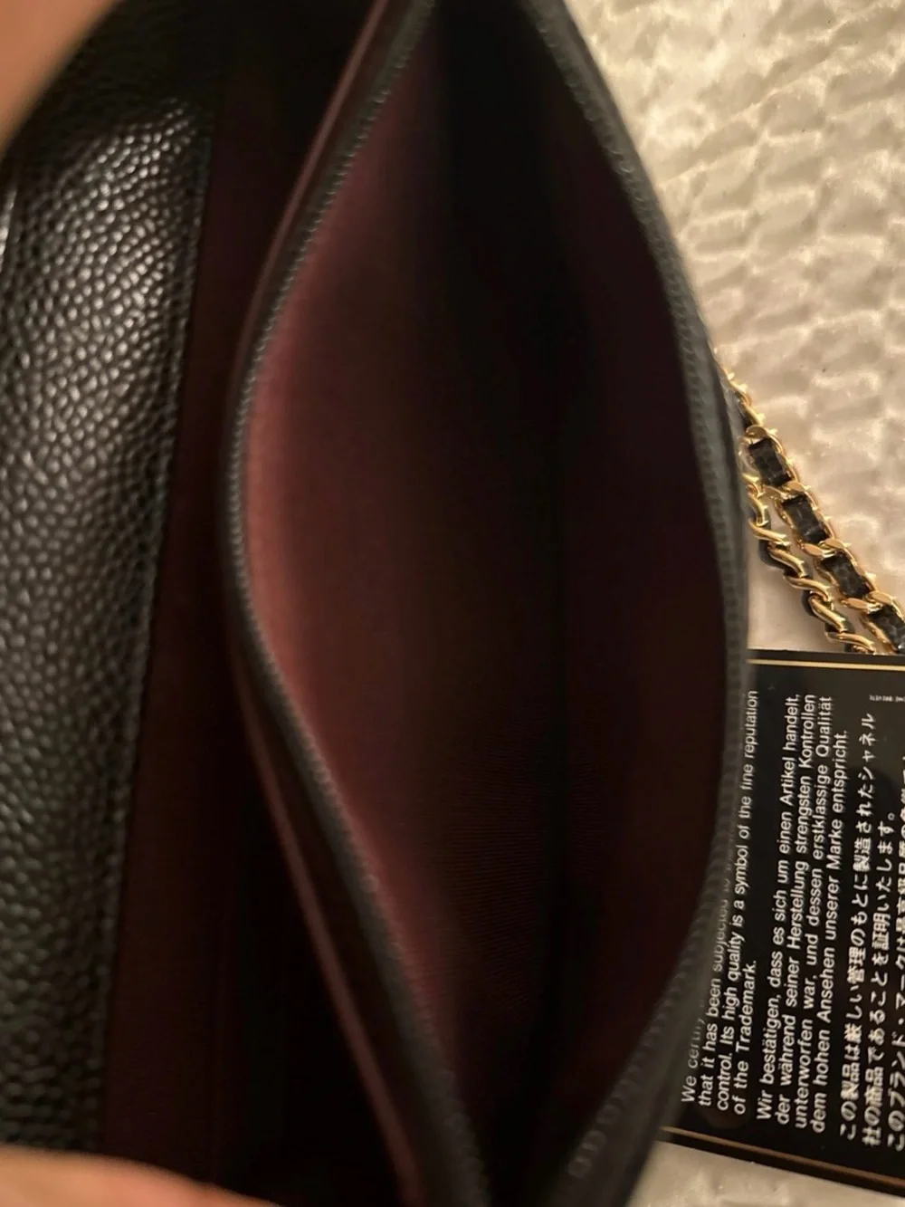 CHANEL Black Quilted Caviar Leather Wallet on Chain with Gold CC